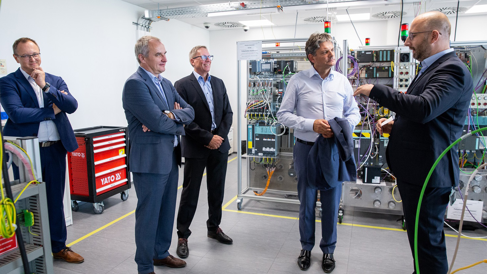 Istvan Petenyi, Peter Zombori, Prof. Dr. Hornegger and György Sandorfalvy in the laboratory facility